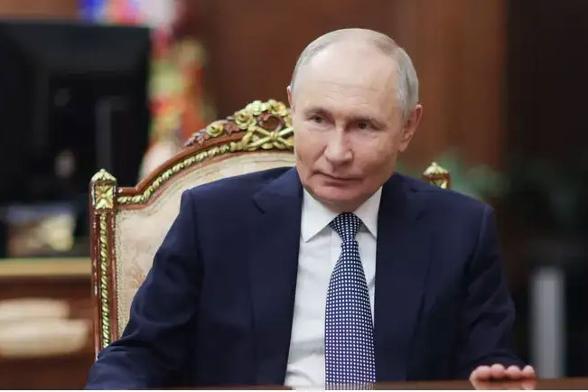 Путин