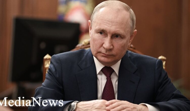 Путин